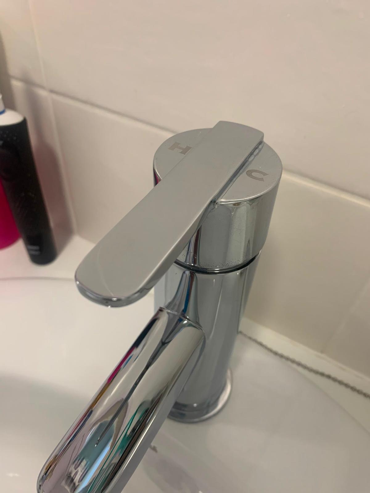 After — Bathroom tap — limescale removed