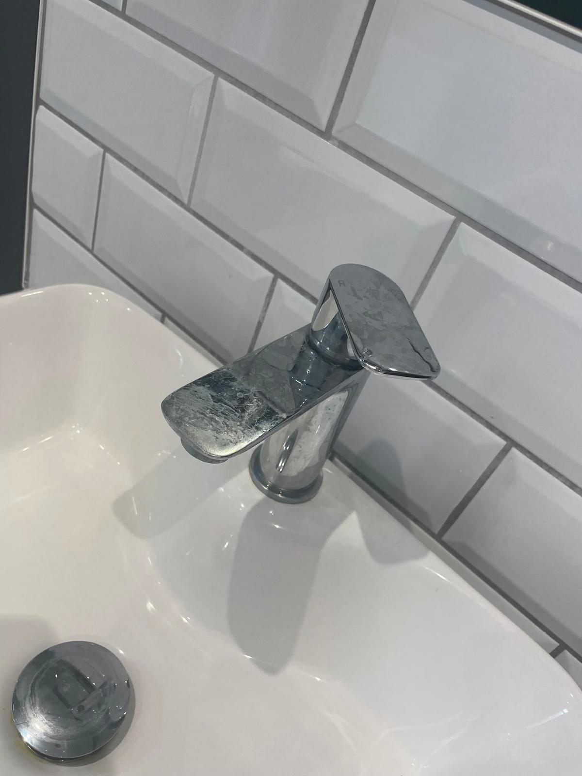 Before — Basin tap — limescale removed